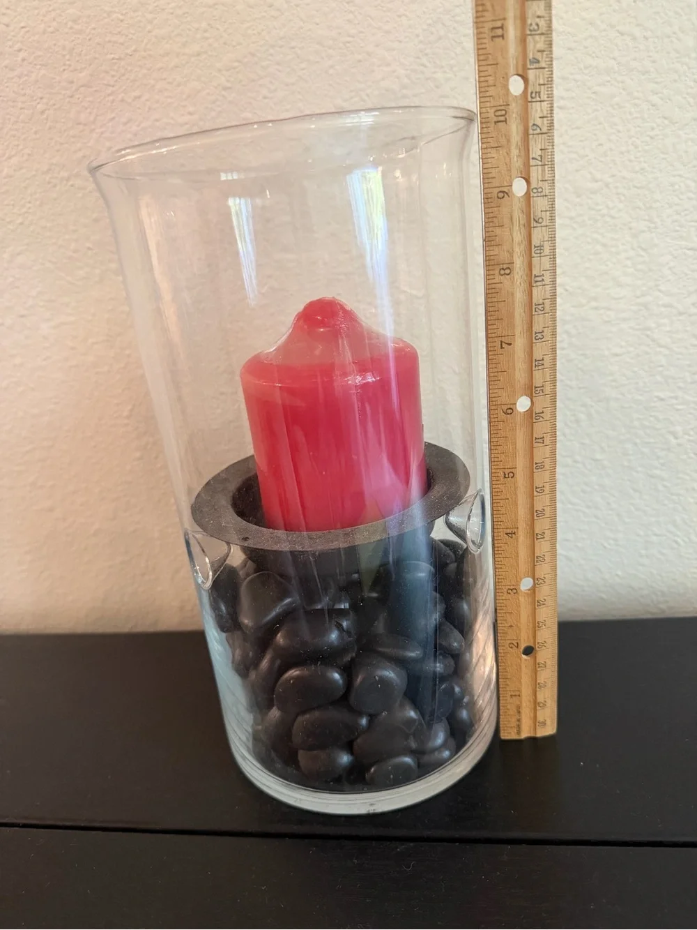 Glass Hurricane Candle Holder with Black Stones and Red Candle